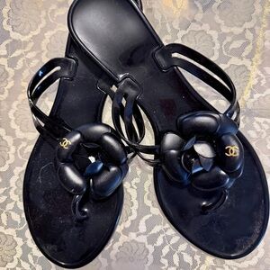 CHANEL Black Camellia Jelly Thong Sandals with Gold Logo